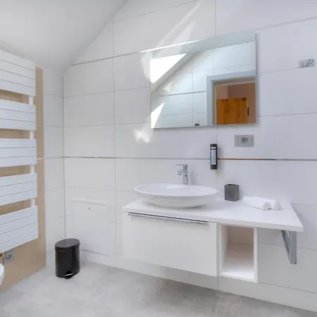 Апартаменты Cozy In With Sauna Rogasovci